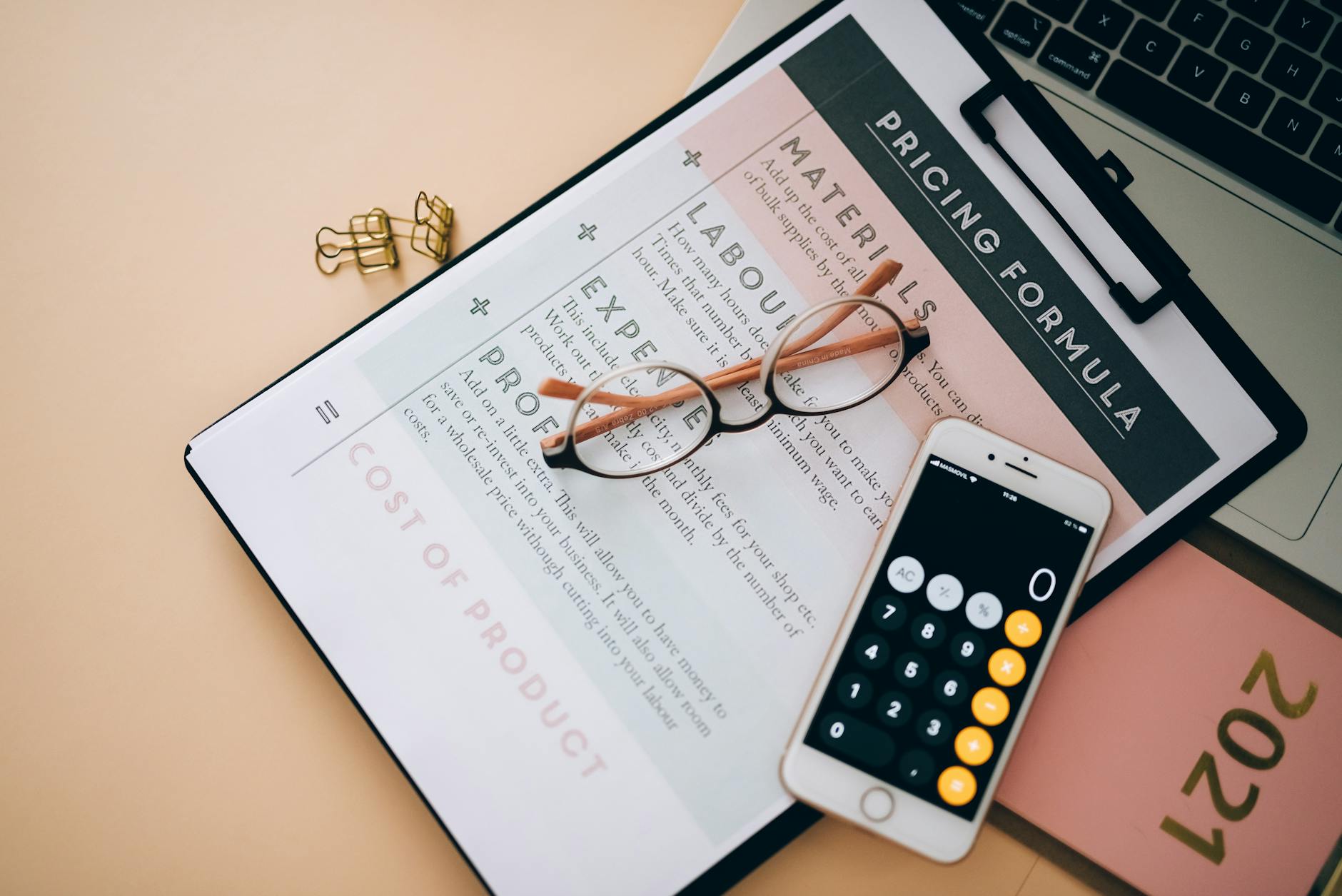 Proposal pricing notes and project scope planning on a desk